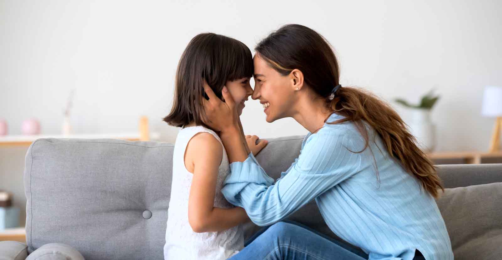 mother smiling at daughter