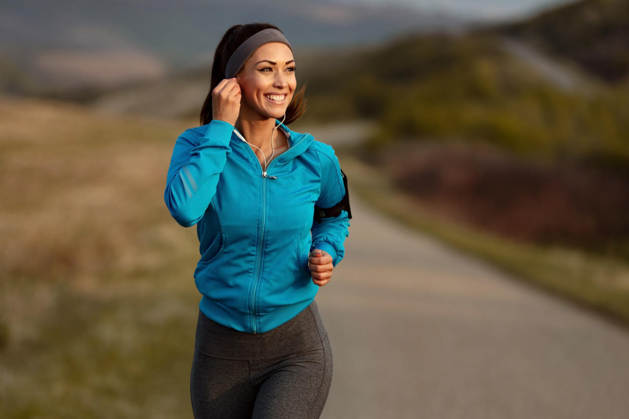 smiling woman running
