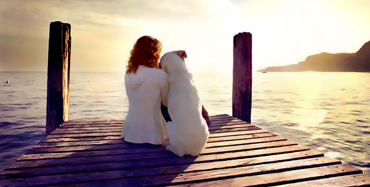 Lady and dog on dock