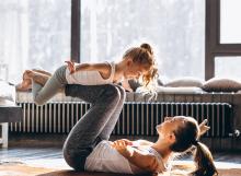 mother exercising with daughter