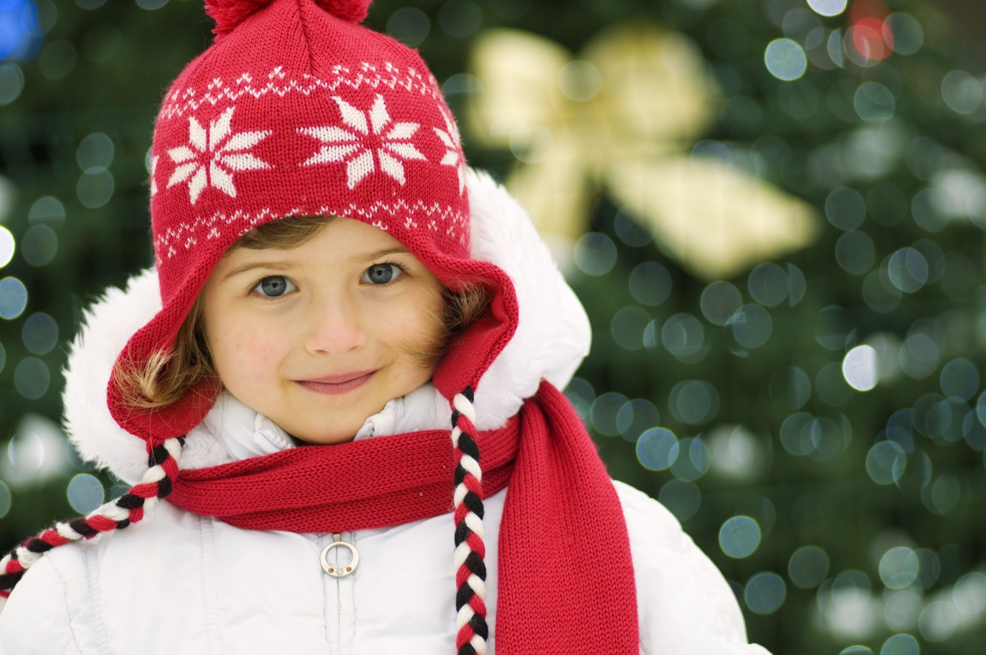 child wearing holiday winter clothes